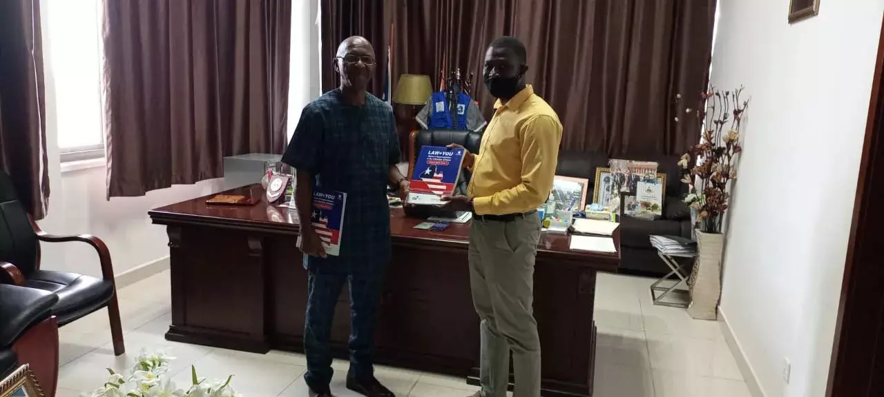 textbooks Two men holding textbook